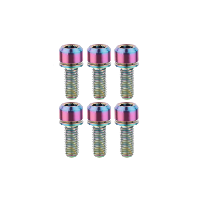 Set of six multicolored screws on a white background